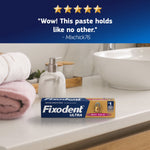 Fixodent Ultra box on a vanity counter beneath a five-star customer quote about paste hold