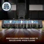 Close-up of a floor cleaning head brushing hardwood floor with motion arrows and product benefit text.