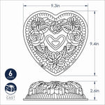 Line-drawing diagram of a floral heart bundt pan with dimensions labeled (9.3in by 9.4in and 2.6in height) and a 6-cup icon.