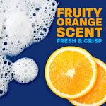 Foamy soap bubbles beside two orange slices with bold copy 'Fruity Orange Scent Fresh & Crisp' on blue field