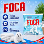 Marketing image showing FOCA logo, product bag, icons for fresh scent and HE compatibility, and a plush seal on a clean background.