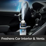 Refresh Your Car fogger can placed in a car interior emitting a visible mist toward the dashboard and vents.