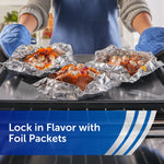 Oven scene showing foil packets on a baking tray being removed, with text about locking in flavor with foil packets