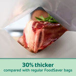 Close-up through a textured vacuum bag showing a piece of meat inside and text claiming the bag is 30% thicker.