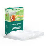 Angled view of FoodSaver pre-cut pint bags packaging with three textured vacuum bags laid in front