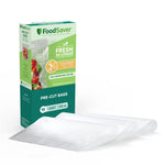Angled product shot of FoodSaver pre-cut quart bags box with three textured vacuum bags displayed in front
