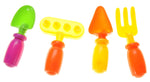 Four small bright plastic children's garden hand tools - trowel, rake, scoop and fork - on white.