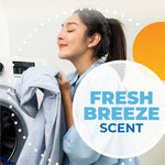 Person smelling laundered clothing with overlaid badge reading 'Fresh Breeze Scent' and decorative graphic elements.