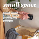 Fresh Wave pod being stuck to the side of a hamper with overlaid labels listing small spaces like hampers, backpacks, and cabinets