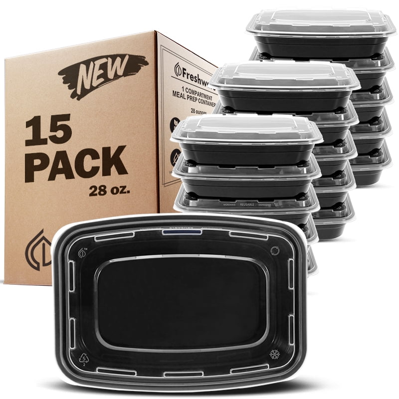 Stacked black rectangular meal prep containers with clear lids beside a cardboard 15 pack box and a single container foreground