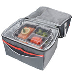 Two stacked three-compartment meal prep containers with clear lids inside an insulated soft-sided lunch bag