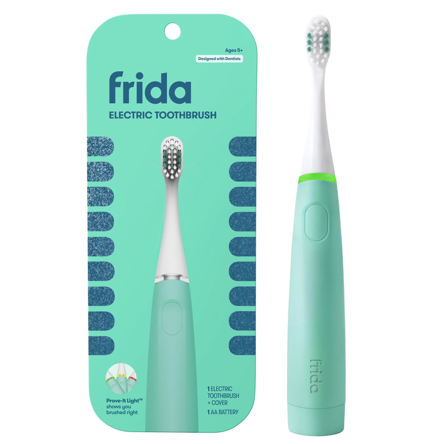 Mint teal Frida electric kids toothbrush shown with retail blister-card packaging and standalone toothbrush