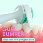 Close-up of a flosser head flossing between model teeth with a visible graphic reading 'GUM BUMPER'.