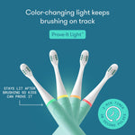Graphic showing four mint teal Frida toothbrush handles with color-changing light feature and timer callouts