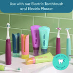 Bathroom scene showing Frida toothpaste tubes, electric toothbrushes and accessories with product callout