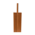 Front view of a tall square ribbed bamboo toilet brush holder with wooden handle on white
