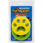 Clear plastic blister pack with yellow paw-shaped FurZapper lint remover on blue backing labeled as a 2 pack