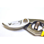 Close-up of a G & F forged bypass pruner blade showing logo, pivot bolt and spring area on a white background.