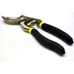 G & F bypass pruner laid flat with black cushioned handles and visible curved cutting blade on white background.