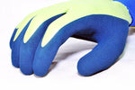 G & F gardening glove resting on a surface showing navy foam-coated fingers and green back panel