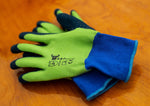 G & F lime green and navy waterproof gardening gloves with water droplets on a wooden surface