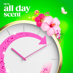 Clock-themed graphic with flowers and text 'up to all day scent' in bright green and pink styling