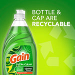 Close-up of Gain Ultra Clean bottle with recyclable message and green gradient background