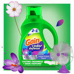 Gain 2-in-1 detergent bottle with flowers and a retro fan illustration promoting lasting freshness