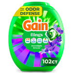 Green oval tub of Gain Flings Moonlight Breeze detergent pods with purple floral accents and 102ct label