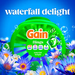 Gain Flings 'waterfall delight' tub surrounded by blue and purple waterlilies and floating bubbles on a vivid background