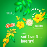 Graphic green background with Gain logo, floral illustrations and copy promoting a fresh laundry scent.