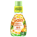 Bottle of Gain Island Fresh fabric softener with bright tropical label and green cap on white background