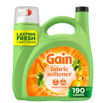 Green Gain fabric softener jug with orange island-fresh label and measuring cap on white background