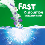 Graphic pouring powder into water with lavender flowers and bold text reading “FAST DISSOLUTION” in English and Spanish