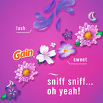 Pink and purple promotional graphic with Gain logo, floral illustrations and copy ‘sniff sniff... oh yeah!’ indicating scent profile