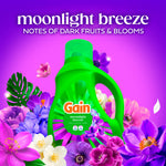 Green Gain Moonlight Breeze detergent bottle surrounded by purple and pink flowers with scent description text