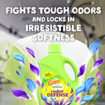 Gain Odor Defense fabric softener bottle in front of a blurred laundry background with text about fighting tough odors