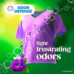 Graphic of a purple shirt with bubbles and floral accents promoting Gain Odor Defense for Moonlight Breeze scent