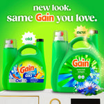 Promotional graphic showing old and new Gain detergent bottles with headline 'new look. same Gain you love.'