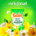 Gain Original dryer sheets box centered among yellow and white flowers with notes of florals and citrus text