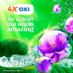 Bubbles, foam and a purple flower with text highlighting ‘4X OXI’ and copy about a clean that smells amazing on green background