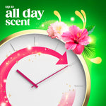 Clock graphic with hibiscus flowers and text indicating long-lasting scent on a green background
