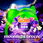 Green Gain Plus detergent jug with vivid purple flowers and 'moonlight breeze' text overlay