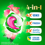 Close-up stylized Gain plus laundry pac with hibiscus flowers and 4-in-1 feature badges on green background