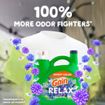 Gain RELAX detergent jug in front of a white T-shirt with purple floral scent graphics and '100% more odor fighters' text