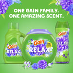 Green promotional graphic showing three Gain RELAX product types with purple floral accents and the headline one gain family