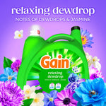 Gain relaxing dewdrop detergent bottle against a purple floral background with scent notes and decorative flowers