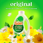 Gain Rinse Out Odor bottle surrounded by yellow and white flowers with 'original' and scent notes text on bright green background
