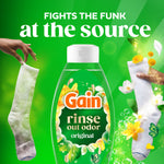 Gain Rinse Out Odor Original bottle between a dirty sock and a clean sock with bold headline about fighting funk
