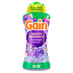 Tall Gain scent booster bottle labeled Moonlight Breeze with purple fragrance beads visible through packaging.